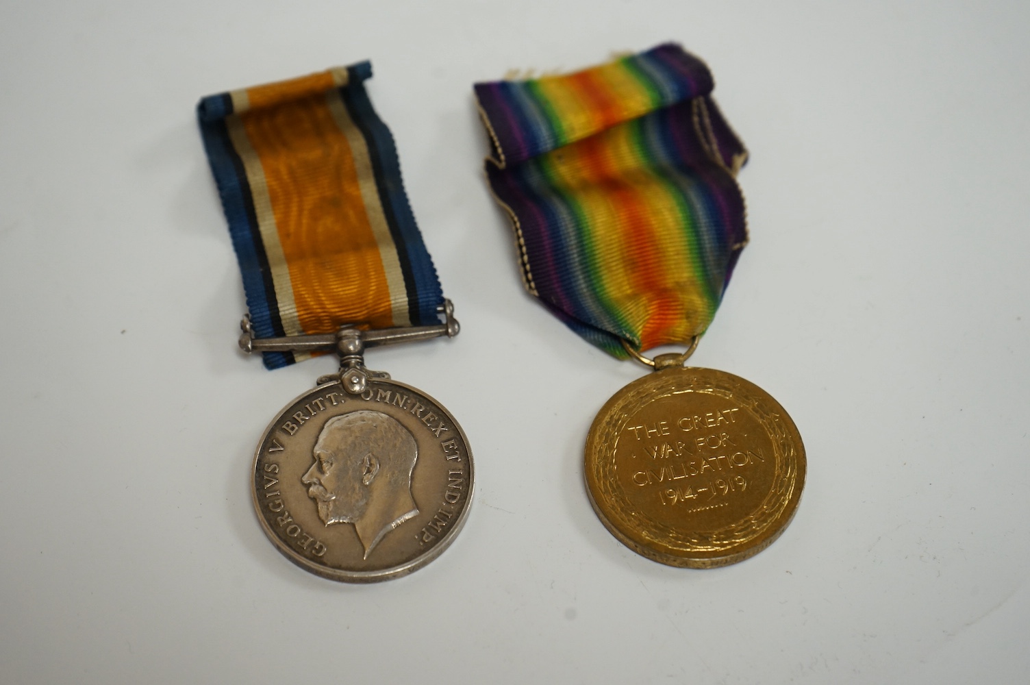 WWI interest - a War Medal and Victory Medal pair for E. M. HODGSON. V. A. D., Condition - fair.